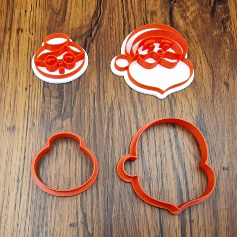 Cutter with embossing - Santa Claus and Mrs. Claus