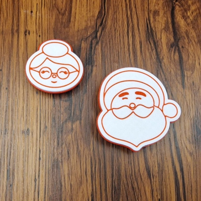 Cutter with embossing - Santa Claus and Mrs. Claus 