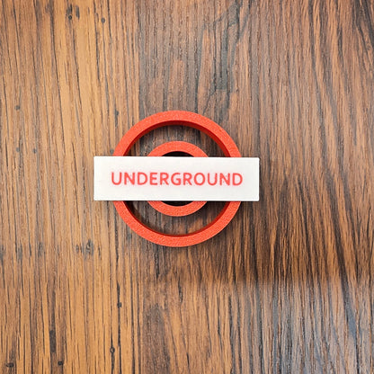 Udstikker med præg - London Underground